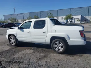 2013 Honda Ridgeline RTL with VIN 5FPYK1F50DB003971, listed as a IAAI auction lot 41946344 with 240,051 mi miles. Bid and sale history available at carsss.com. Image 14.