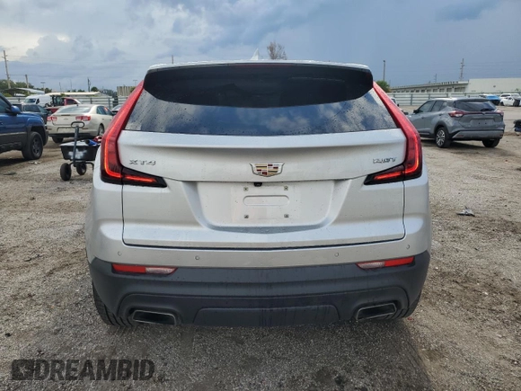 2019 Cadillac XT4 FWD Luxury z VIN 1GYAZAR42KF119510, wystawiony jako Copart lot #48979395 z przebiegiem 57 498 mil mil oraz Szkoda całkowita • Salvage title. Historia ofert i sprzedaży dostępna na DreamBid. Obrazek 6.