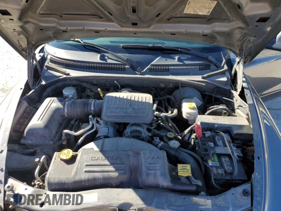 2004 Dodge Dakota Sport z VIN 1D7HG38K94S556894, wystawiony jako Copart lot #79743994 z przebiegiem 174 933 mil mil oraz Szkoda całkowita • Salvage title. Historia ofert i sprzedaży dostępna na DreamBid. Obrazek 13.
