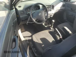 2007 Hyundai Accent GS with VIN KMHCM36CX7U045059, listed as a Copart auction lot 52089115 with 88,166 mi miles and Salvage title. Bid and sale history available at DreamBid. Image 8.