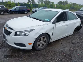 2014 Chevrolet Cruze 1LT with VIN 1G1PC5SB6E7233051, listed as a IAAI auction lot 42214334 with 88,389 mi miles and . Bid and sale history available at DreamBid. Image 2.