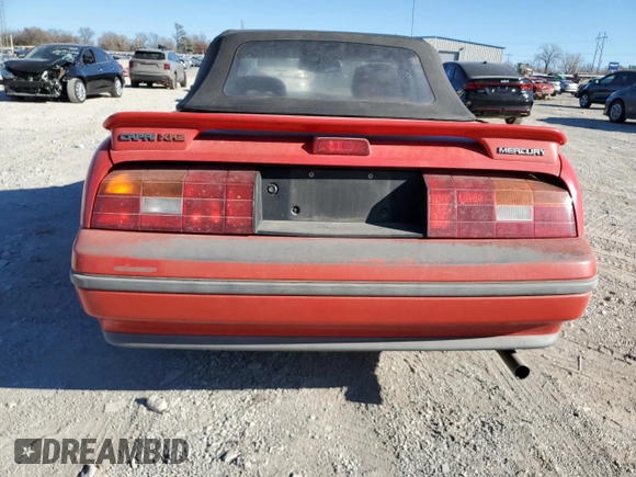 1991 Mercury Capri z VIN 6MPCT0369M8627509, wystawiony jako Copart lot #86108114 z przebiegiem 112 629 mil mil oraz Szkoda całkowita • Salvage title. Historia ofert i sprzedaży dostępna na DreamBid. Obrazek 6.