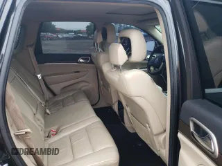 2014 Jeep Grand Cherokee Limited z VIN 1C4RJFBG7EC546642, wystawiony jako Copart lot #61445615 z przebiegiem 128 921 mil mil oraz Szkoda całkowita • Salvage title. Historia ofert i sprzedaży dostępna na DreamBid. Obrazek 10.