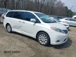 2015 Toyota Sienna XLE with VIN 5TDYK3DC0FS570007, listed as a IAAI auction lot 41794333 with 217,512 mi miles. Bid and sale history available at carsss.com. Image 1.