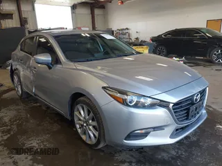 2017 Mazda 3 Touring with VIN 3MZBN1L77HM117184, listed as a IAAI auction lot 42460172 with 84,694 mi miles and . Bid and sale history available at DreamBid. Image 1.