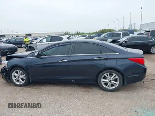 2012 Hyundai Sonata SE z VIN 5NPEC4AC7CH341786, wystawiony jako IAAI lot #41890326 z przebiegiem 114 678 mil mil oraz . Historia ofert i sprzedaży dostępna na DreamBid. Obrazek 15.
