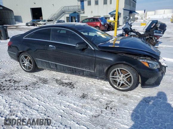 2015 Mercedes-Benz E 400 with VIN WDDKJ6HB8FF299070, listed as a Copart auction lot 46932605 with 133,432 mi miles and Salvage Title. Bid and sale history available at DreamBid. Image 4.