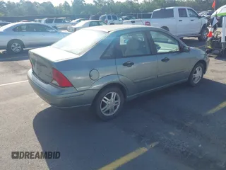 2003 Ford Focus SE with VIN 1FAFP34P13W304346, listed as a IAAI auction lot 42706827 with 239,800 mi miles and . Bid and sale history available at DreamBid. Image 4.