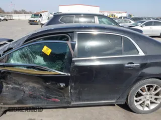 2009 Chevrolet Malibu LTZ with VIN 1G1ZK57B59F191486, listed as a IAAI auction lot 41743856 with Not Provided miles and . Bid and sale history available at DreamBid. Image 14.