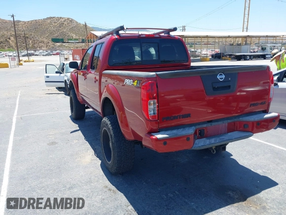 2015 Nissan Frontier SL with VIN 1N6AD0EV1FN711521, listed as a IAAI auction lot 42525352 with 203,114 mi miles and . Bid and sale history available at DreamBid. Image 3.