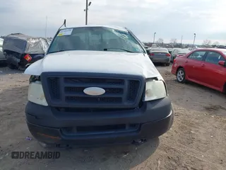 2005 Ford F-150 STX with VIN 1FTRX14W85FB72787, listed as a IAAI auction lot 41702370 with 210,544 mi miles. Bid and sale history available at carsss.com. Image 12.
