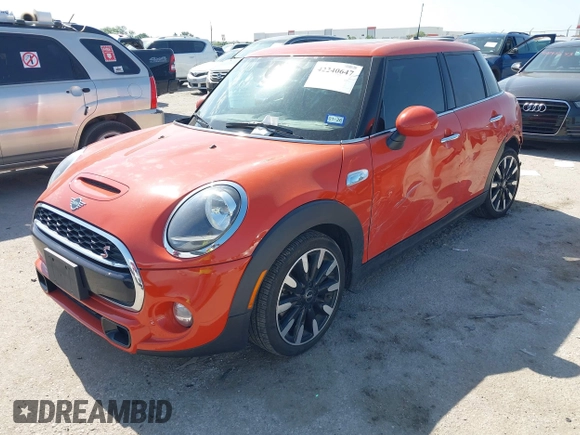 2019 MINI Hardtop 4 Door Cooper S with VIN WMWXU3C57K2B64946, listed as a IAAI auction lot 42240647 with 87,704 mi miles and . Bid and sale history available at DreamBid. Image 18.