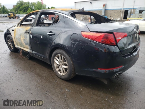2013 Kia Optima LX z VIN 5XXGM4A72DG221738, wystawiony jako Copart lot #58740985 z przebiegiem Nie podano mil oraz Szkoda całkowita • Salvage title. Historia ofert i sprzedaży dostępna na DreamBid. Obrazek 2.