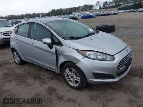 2018 Ford Fiesta SE with VIN 3FADP4EJ9JM127985, listed as a IAAI auction lot 41726193 with 999,999 mi miles. Bid and sale history available at carsss.com. Image 1.