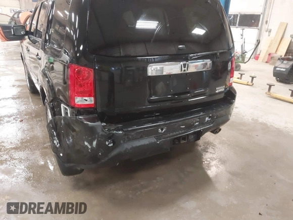 2012 Honda Pilot Touring with VIN 5FNYF4H91CB067014, listed as a IAAI auction lot 41749402 with 151,248 mi miles. Bid and sale history available at carsss.com. Image 6.