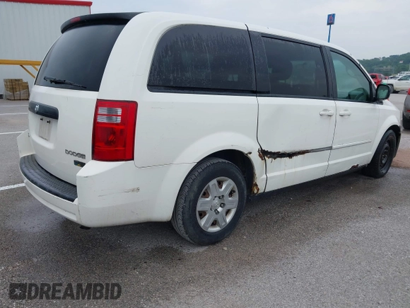 2009 Dodge Grand Caravan SE with VIN 1D8HN44E49B511845, listed as a IAAI auction lot 42490697 with 379,412 mi miles and . Bid and sale history available at DreamBid. Image 4.