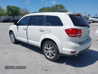 2014 Dodge Journey SXT with VIN 3C4PDCBG4ET235848, listed as a IAAI auction lot 41824155 with 48,691 mi miles and . Bid and sale history available at DreamBid. Image 3.