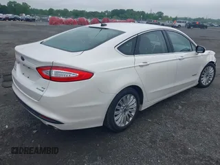 2014 Ford Fusion SE Hybrid с VIN 3FA6P0LUXER125766, выставлен на аукционе IAAI как лот 42178177 с пробегом 284 385 миль миль и . История ставок и продаж доступна на DreamBid. Изображение 4.