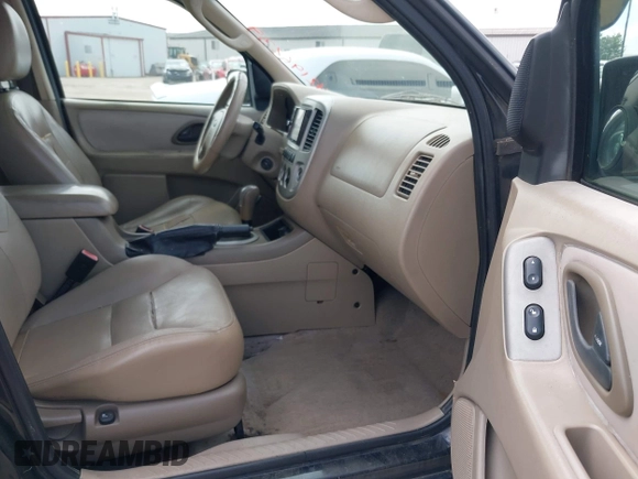 2005 Ford Escape Limited with VIN 1FMYU04155KE48512, listed as a IAAI auction lot 42196239 with 307,005 mi miles and . Bid and sale history available at DreamBid. Image 5.