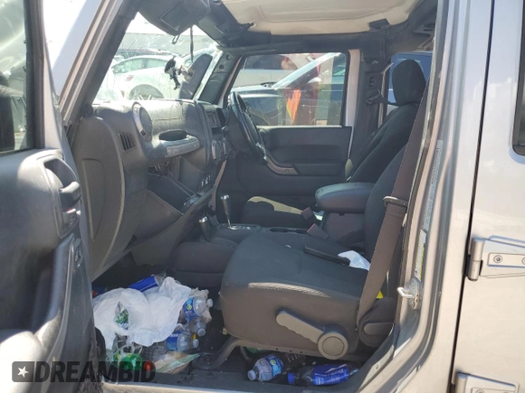 2018 Jeep Wrangler JK Unlimited Sport S with VIN 1C4BJWDG4JL849953, listed as a Copart auction lot 65655094 with 134,578 mi miles and Salvage Title. Bid and sale history available at carsss.com. Image 7.