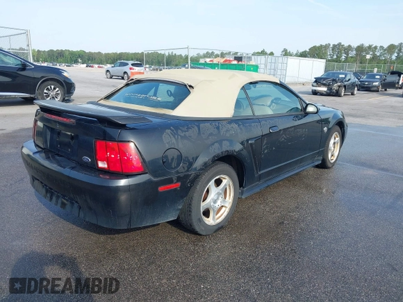 2004 Ford Mustang Deluxe with VIN 1FAFP446X4F187154, listed as a IAAI auction lot 42068363 with 125,074 mi miles. Bid and sale history available at carsss.com. Image 4.