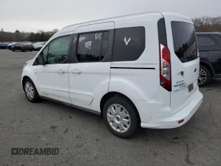 2015 Ford Transit Connect XLT with VIN NM0AE8F77F1202312, listed as a Copart auction lot 87724125 with 100,463 mi miles and Salvage title. Bid and sale history available at DreamBid. Image 2.