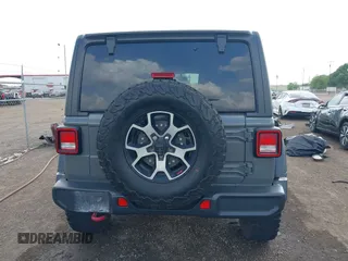 2020 Jeep Wrangler Unlimited Rubicon z VIN 1C4HJXFG7LW193665, wystawiony jako IAAI lot #41874930 z przebiegiem 58 884 mil mil oraz . Historia ofert i sprzedaży dostępna na DreamBid. Obrazek 16.