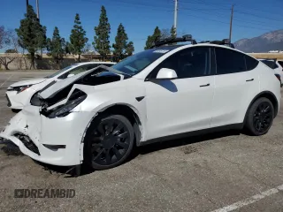 2022 Tesla Model Y Long Range with VIN 7SAYGDEE4NF357428, listed as a Copart auction lot 50345715 with 45,168 mi miles and Salvage Title. Bid and sale history available at carsss.com. Image 1.