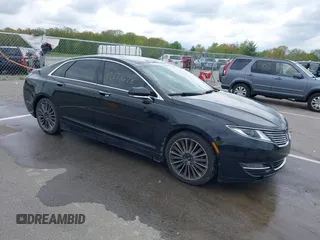 2016 Lincoln MKZ z VIN 3LN6L2J95GR601159, wystawiony jako IAAI lot #42177678 z przebiegiem 86 480 mil mil oraz . Historia ofert i sprzedaży dostępna na DreamBid. Obrazek 1.