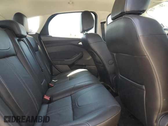 2014 Ford Focus Titanium with VIN 1FADP3N2XEL423320, listed as a Copart auction lot 58709875 with 93,011 mi miles and Salvage title. Bid and sale history available at DreamBid. Image 10.