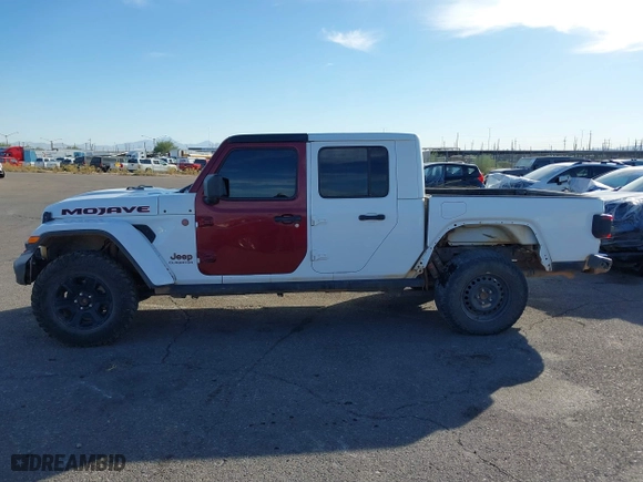 2022 Jeep Gladiator Mojave with VIN 1C6JJTEG6NL100383, listed as a IAAI auction lot 40712989 with 35,283 mi miles. Bid and sale history available at carsss.com. Image 14.