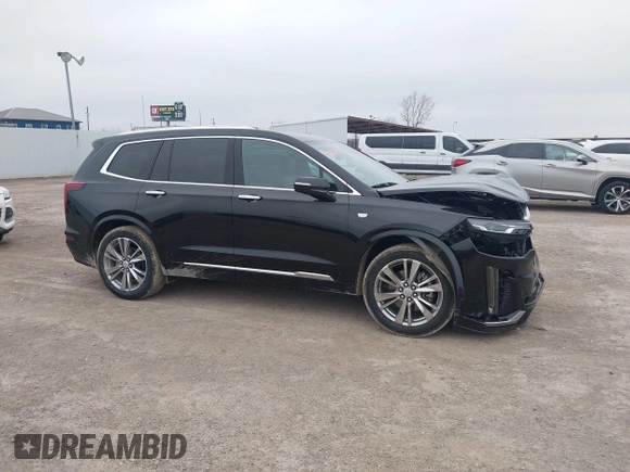2023 Cadillac XT6 FWD Premium Luxury with VIN 1GYKPCRS8PZ231089, listed as a IAAI auction lot 41500954 with 36,455 mi miles and . Bid and sale history available at DreamBid. Image 13.