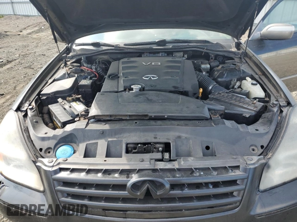 2005 Infiniti Q45 z VIN JNKBF01A45M100941, wystawiony jako Copart lot #71366494 z przebiegiem 117 616 mil mil oraz Czysty tytuł • Clean title. Historia ofert i sprzedaży dostępna na DreamBid. Obrazek 11.
