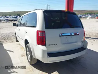 2010 Dodge Grand Caravan SXT with VIN 2D4RN5D1XAR462150, listed as a IAAI auction lot 41466381 with 204,531 mi miles and . Bid and sale history available at DreamBid. Image 3.