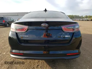 2014 Kia Optima Hybrid EX with VIN KNAGN4AD7E5068408, listed as a Copart auction lot 71589104 with 134,198 mi miles and Salvage Title. Bid and sale history available at carsss.com. Image 6.