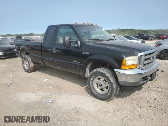 2001 Ford F-350 XL with VIN 1FTSX31F11ED72055, listed as a Copart auction lot 66164624 with 228,597 mi miles and Salvage Title. Bid and sale history available at DreamBid. Image 4.