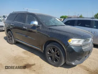 2012 Dodge Durango Crew with VIN 1C4RDHDG4CC121876, listed as a IAAI auction lot 41871302 with 150,261 mi miles and . Bid and sale history available at DreamBid. Image 1.