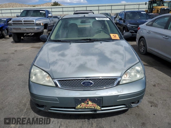 2005 Ford Focus S with VIN 1FAFP34N35W235922, listed as a Copart auction lot 54729854 with Not Provided miles and Salvage Title. Bid and sale history available at carsss.com. Image 5.