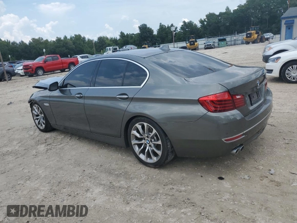 2014 BMW 5 Series 535d with VIN WBAXA5C50ED691107, listed as a Copart auction lot 64393794 with 114,627 mi miles and Salvage Title. Bid and sale history available at DreamBid. Image 2.