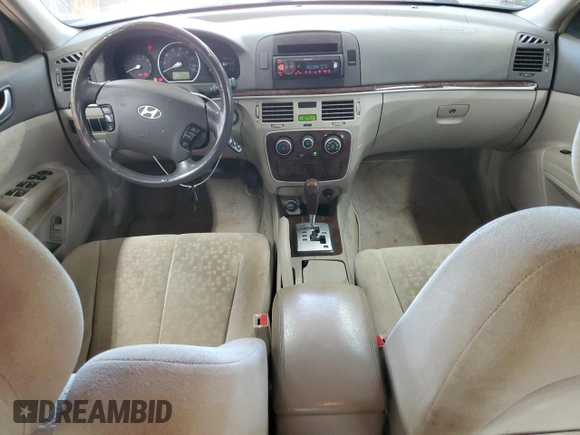 2006 Hyundai Sonata GLS z VIN KMHEU46C06A116199, wystawiony jako Copart lot #53669785 z przebiegiem 290 545 mil mil oraz Szkoda całkowita • Salvage title. Historia ofert i sprzedaży dostępna na DreamBid. Obrazek 8.