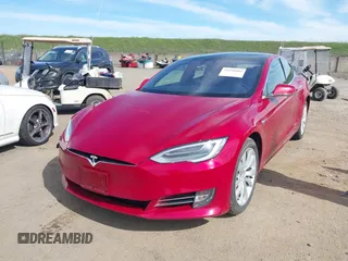 2018 Tesla Model S 75D with VIN 5YJSA1E26JF259651, listed as a IAAI auction lot 41690804 with Not Provided miles and . Bid and sale history available at DreamBid. Image 2.
