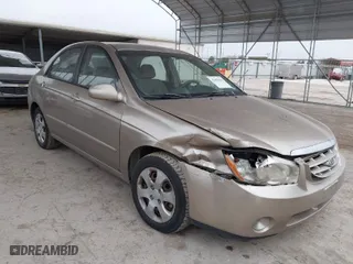2004 Kia Spectra LX with VIN KNAFE121245064294, listed as a IAAI auction lot 41424241 with 110,136 mi miles. Bid and sale history available at carsss.com. Image 1.
