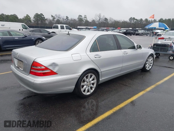 2002 Mercedes-Benz S-Class 5.0L with VIN WDBNG75J82A264932, listed as a IAAI auction lot 41388088 with 195,747 mi miles. Bid and sale history available at carsss.com. Image 4.
