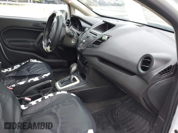 2015 Ford Fiesta S with VIN 3FADP4TJ4FM179759, listed as a IAAI auction lot 42486808 with 91,166 mi miles and . Bid and sale history available at DreamBid. Image 5.