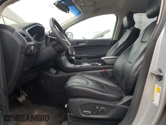 2015 Ford Edge Titanium z VIN 2FMTK4K9XFBB56155, wystawiony jako Copart lot #56735555 z przebiegiem 86 167 mil mil oraz Szkoda całkowita • Salvage title. Historia ofert i sprzedaży dostępna na DreamBid. Obrazek 7.