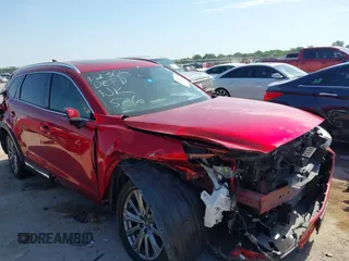 2021 Mazda CX-9 Signature with VIN JM3TCBEY9M0500122, listed as a IAAI auction lot 42252561 with 46,154 mi miles and . Bid and sale history available at DreamBid. Image 1.