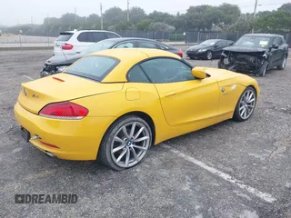 2011 BMW Z4 sDrive35i with VIN WBALM7C58BE383383, listed as a IAAI auction lot 41381714 with 55,704 mi miles. Bid and sale history available at carsss.com. Image 4.