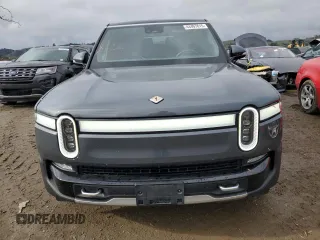 2023 Rivian R1S Adventure with VIN 7PDSGBBA5PN021048, listed as a Copart auction lot 44407815 with 10,642 mi miles and Salvage Title. Bid and sale history available at carsss.com. Image 5.