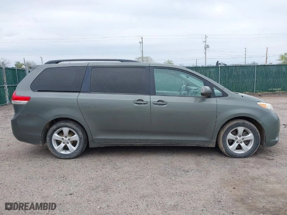 2011 Toyota Sienna LE AAS with VIN 5TDKK3DCXBS119702, listed as a IAAI auction lot 41954050 with 214,873 mi miles. Bid and sale history available at carsss.com. Image 13.