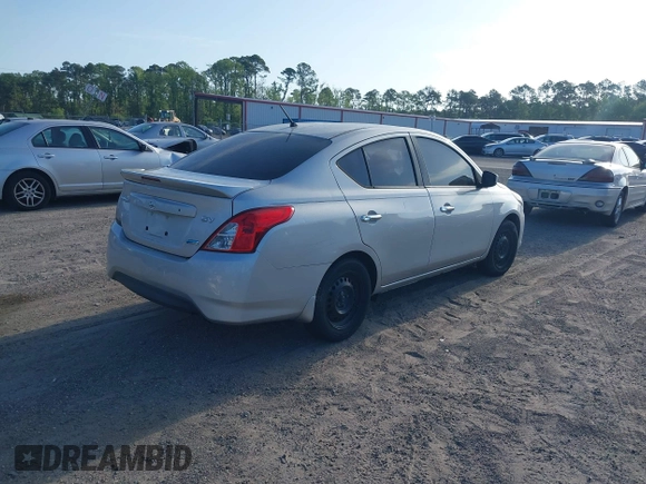 2015 Nissan Versa SV with VIN 3N1CN7AP6FL863791, listed as a IAAI auction lot 42140790 with 141,759 mi miles. Bid and sale history available at carsss.com. Image 4.